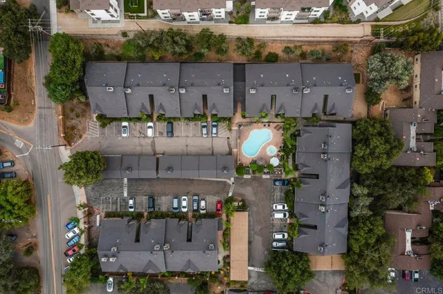 an aerial view of a house with outdoor space