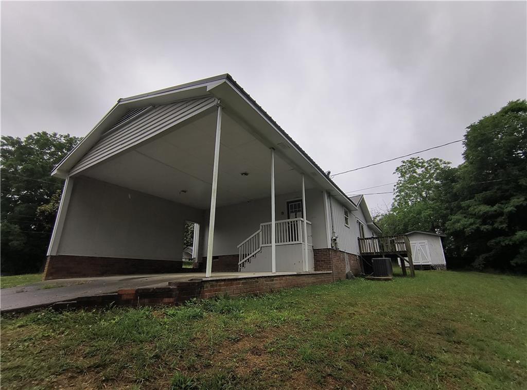 89 Murray Springs Road Chatsworth, GA 30705 - Photo 3 of 14 a house view with a outdoor space