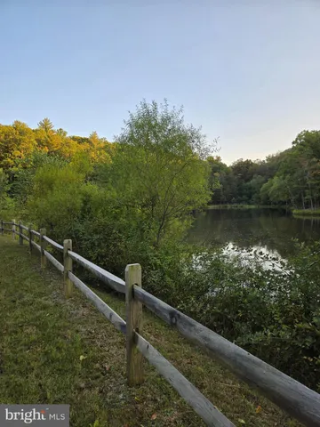 a view of a lake from a balcony