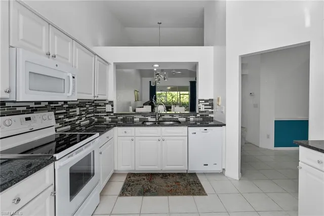 $459,900 | 7077 Lone Oak Boulevard, Naples, FL 34109