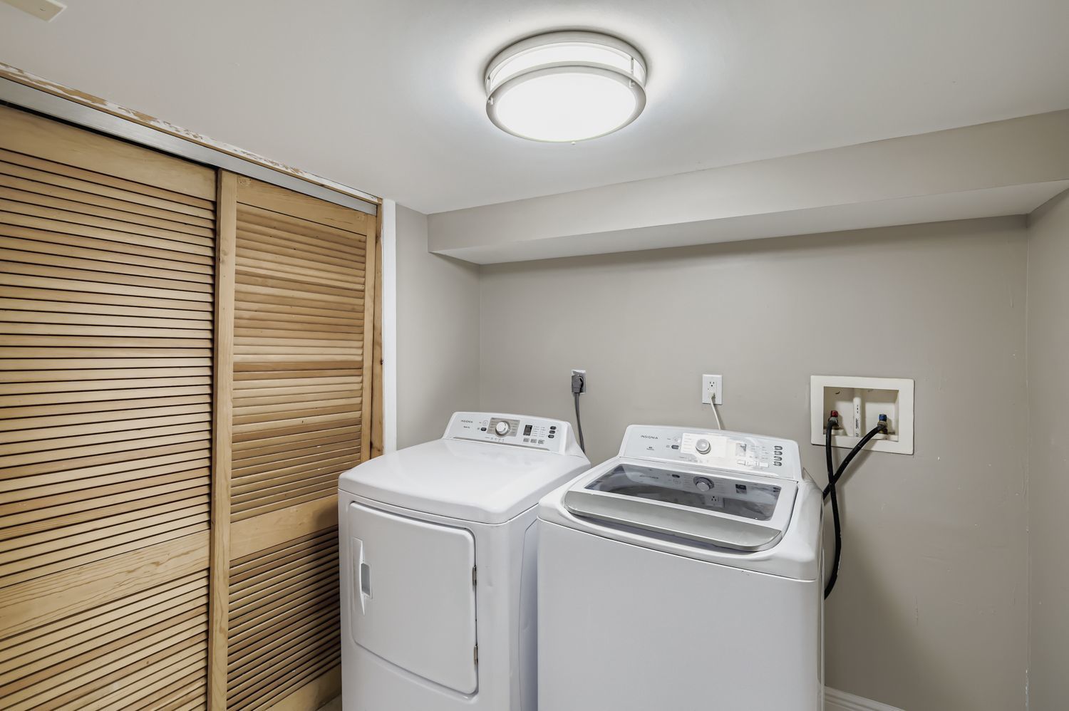 2131 Ash Street, Unit G Des Plaines, IL 60018 - Photo 16 of 16 a view of washer and dryer with bathroom in the background