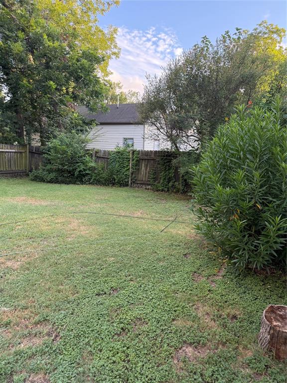 300 Northwest 3rd Street Hubbard, TX 76648 - Photo 22 of 25 Expansive green space featuring perimeter fencing and mature trees