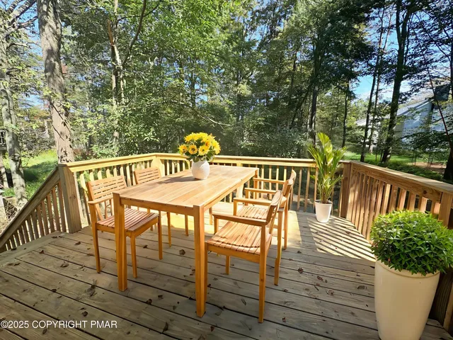 a view of balcony with furniture