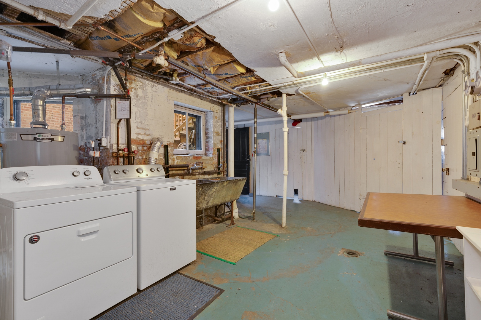 2113 West Concord Place Chicago, IL 60647 - Photo 18 of 20 a room with storage and utility