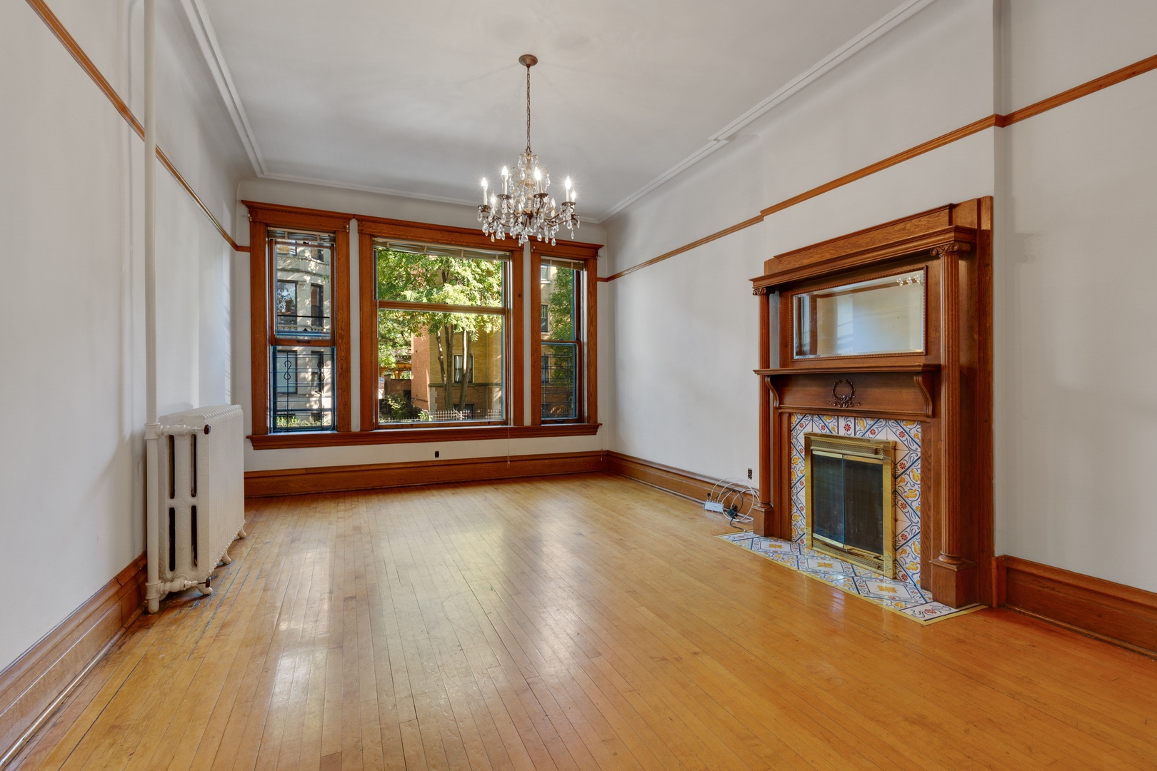 2113 West Concord Place Chicago, IL 60647 - Photo 2 of 20 a view of an empty room with window and fire place