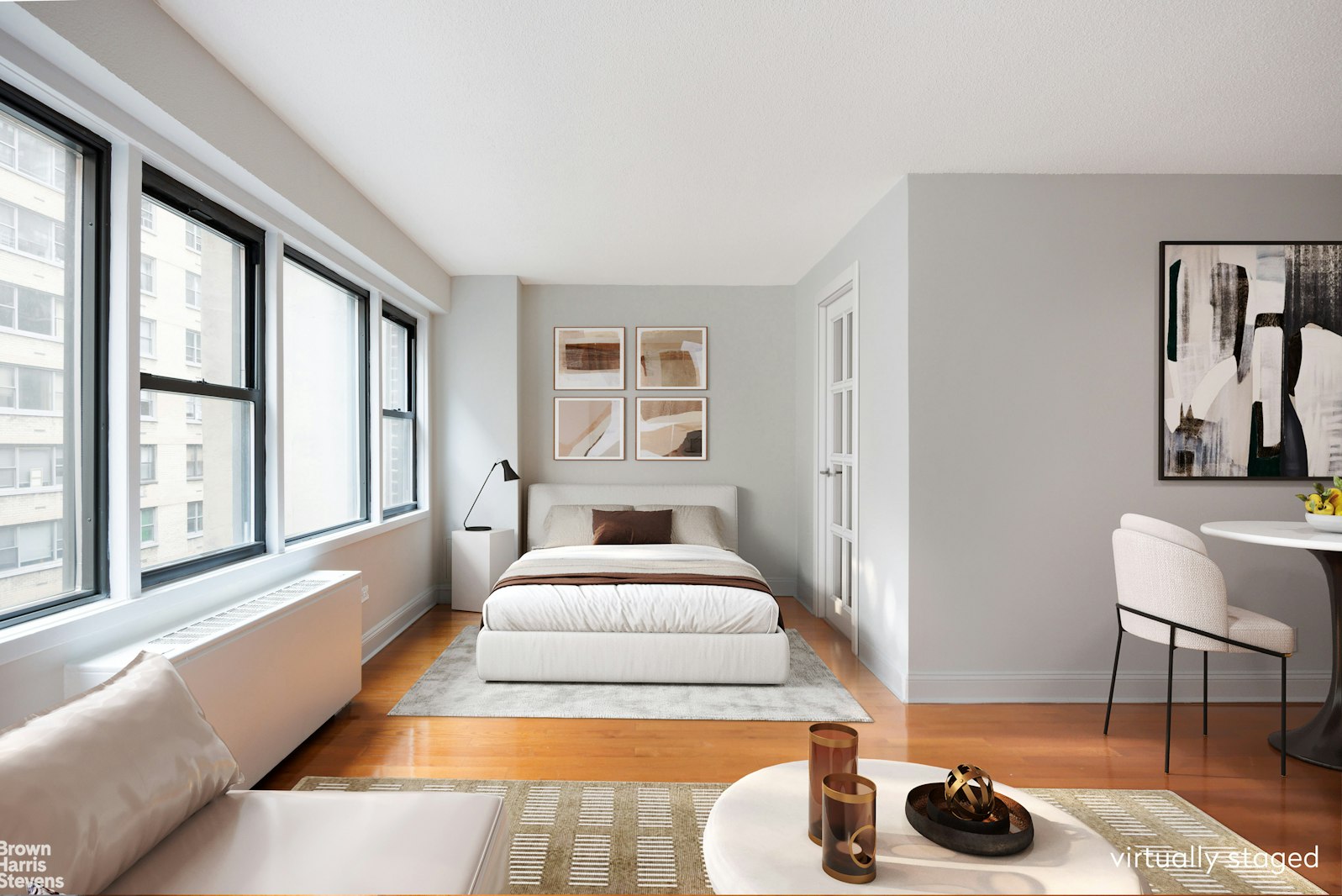 520 East 81st Street, Unit 5A Manhattan, NY 10028 - Photo 2 of 9 a spacious bedroom with a bed and a large window