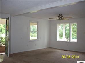 149 Westmoreland Road Mooresville, NC 28115 - Photo 5 of 9 a view of an empty room with a window
