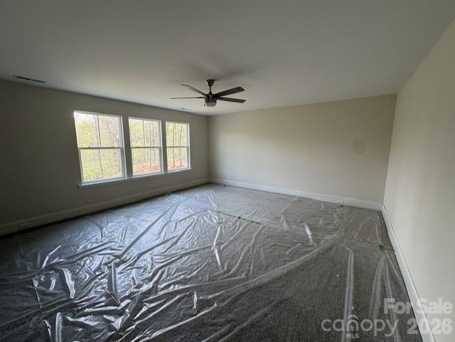 250 Ashley Acres Road Statesville, NC 28677 - Photo 17 of 21 an empty room with windows