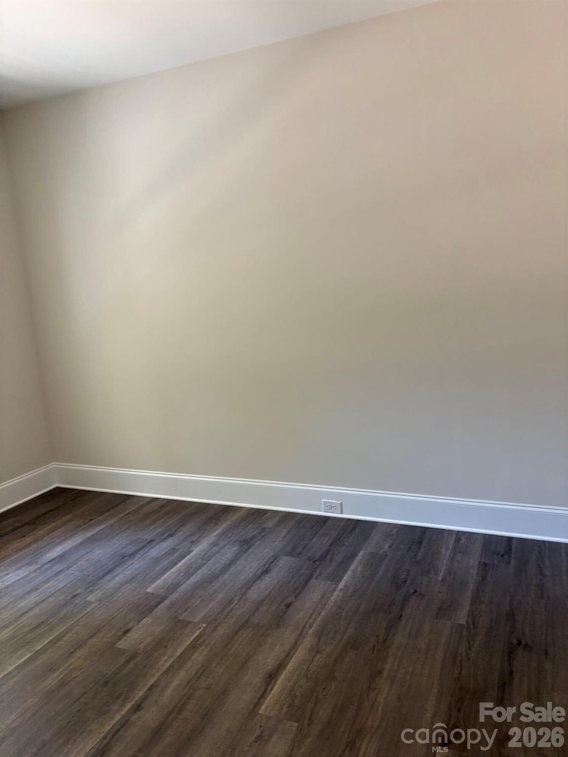 250 Ashley Acres Road Statesville, NC 28677 - Photo 21 of 21 a view of an empty room with wooden floor