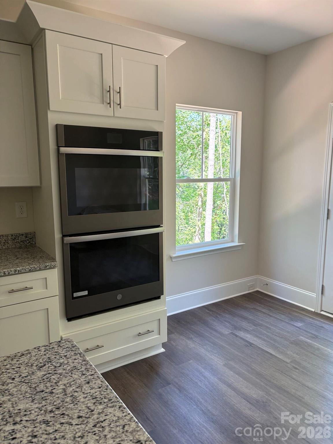 250 Ashley Acres Road Statesville, NC 28677 - Photo 9 of 21 a stove top oven sitting inside of a kitchen