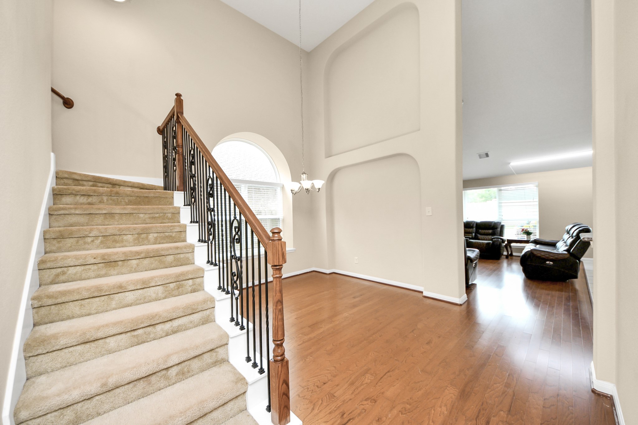 15210 Paxton Landing Lane Cypress, TX 77433 - Photo 13 of 50 a view of entryway and hall with wooden floor