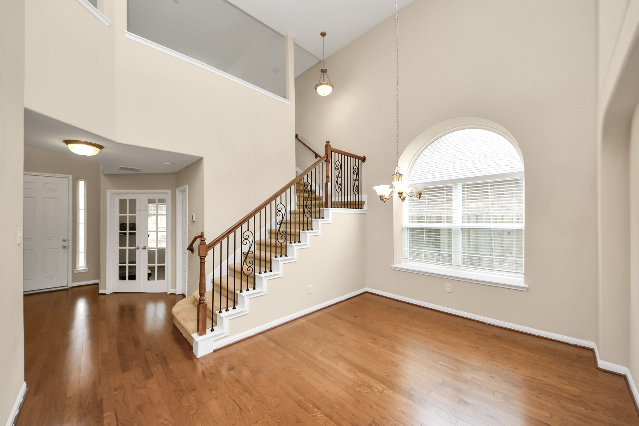 15210 Paxton Landing Lane Cypress, TX 77433 - Photo 15 of 50 a view of an entryway with wooden floor and door