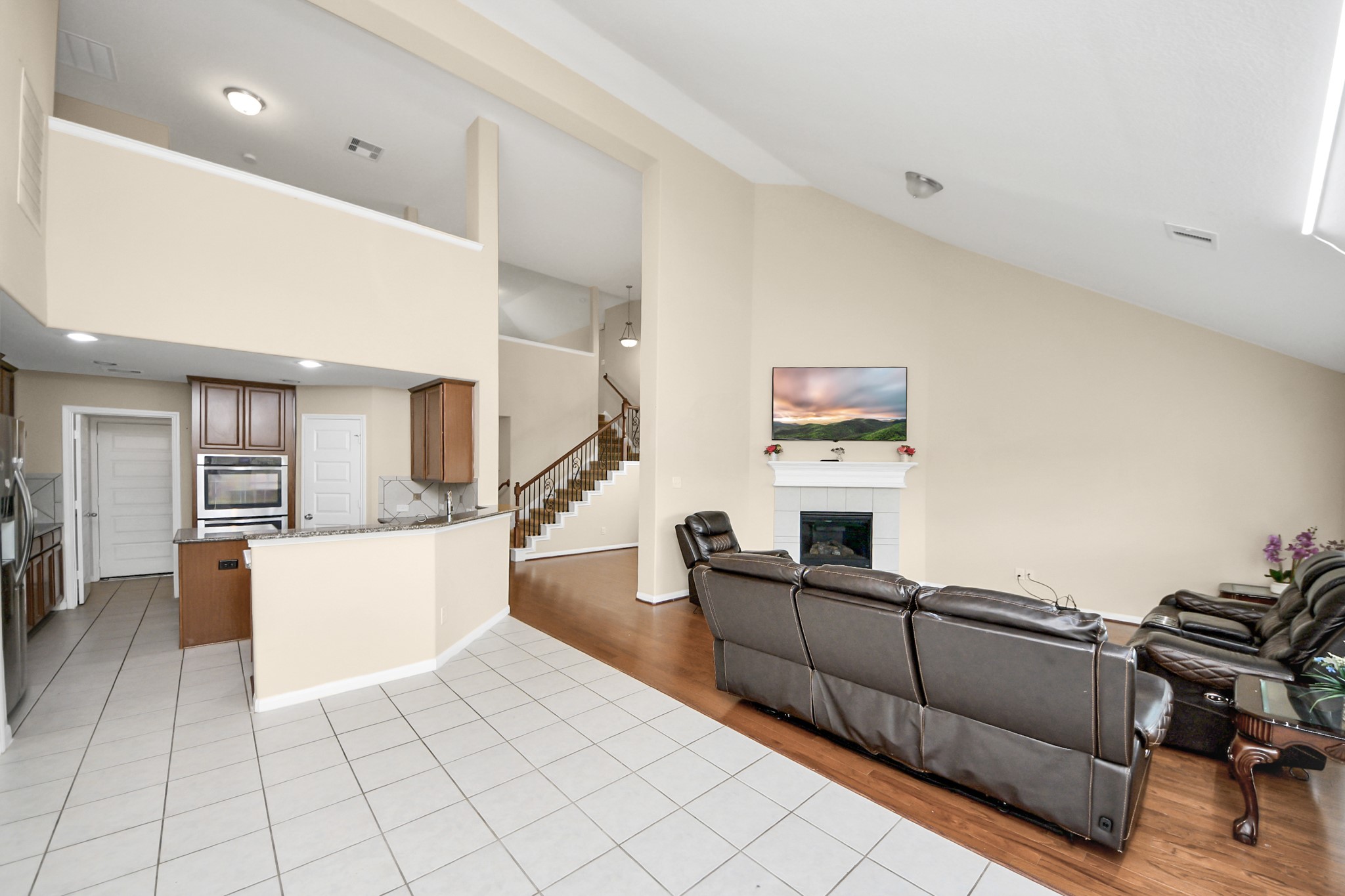 15210 Paxton Landing Lane Cypress, TX 77433 - Photo 18 of 50 a living room with furniture and a flat screen tv