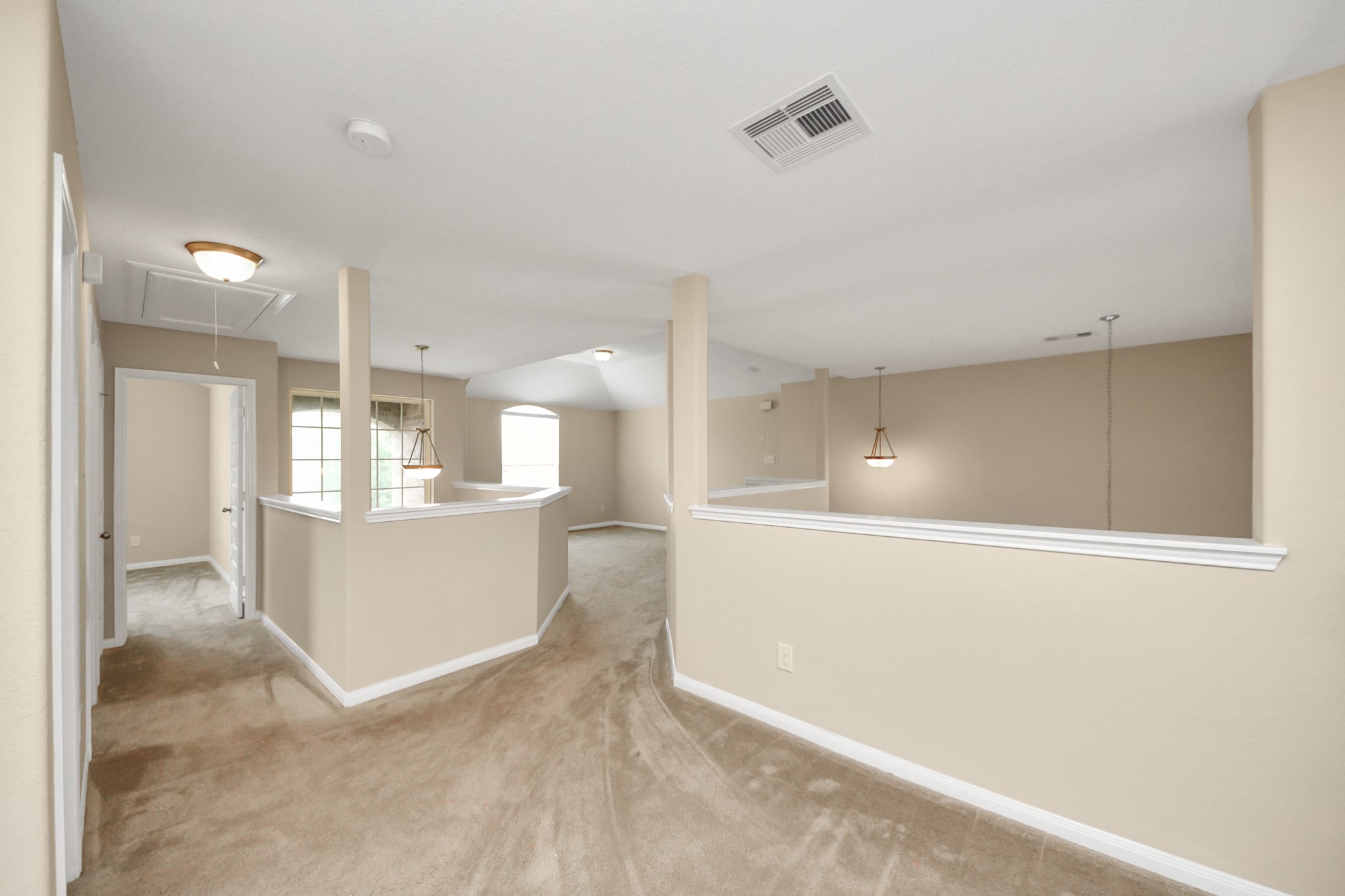15210 Paxton Landing Lane Cypress, TX 77433 - Photo 41 of 50 a view of a big room with wooden floor and windows