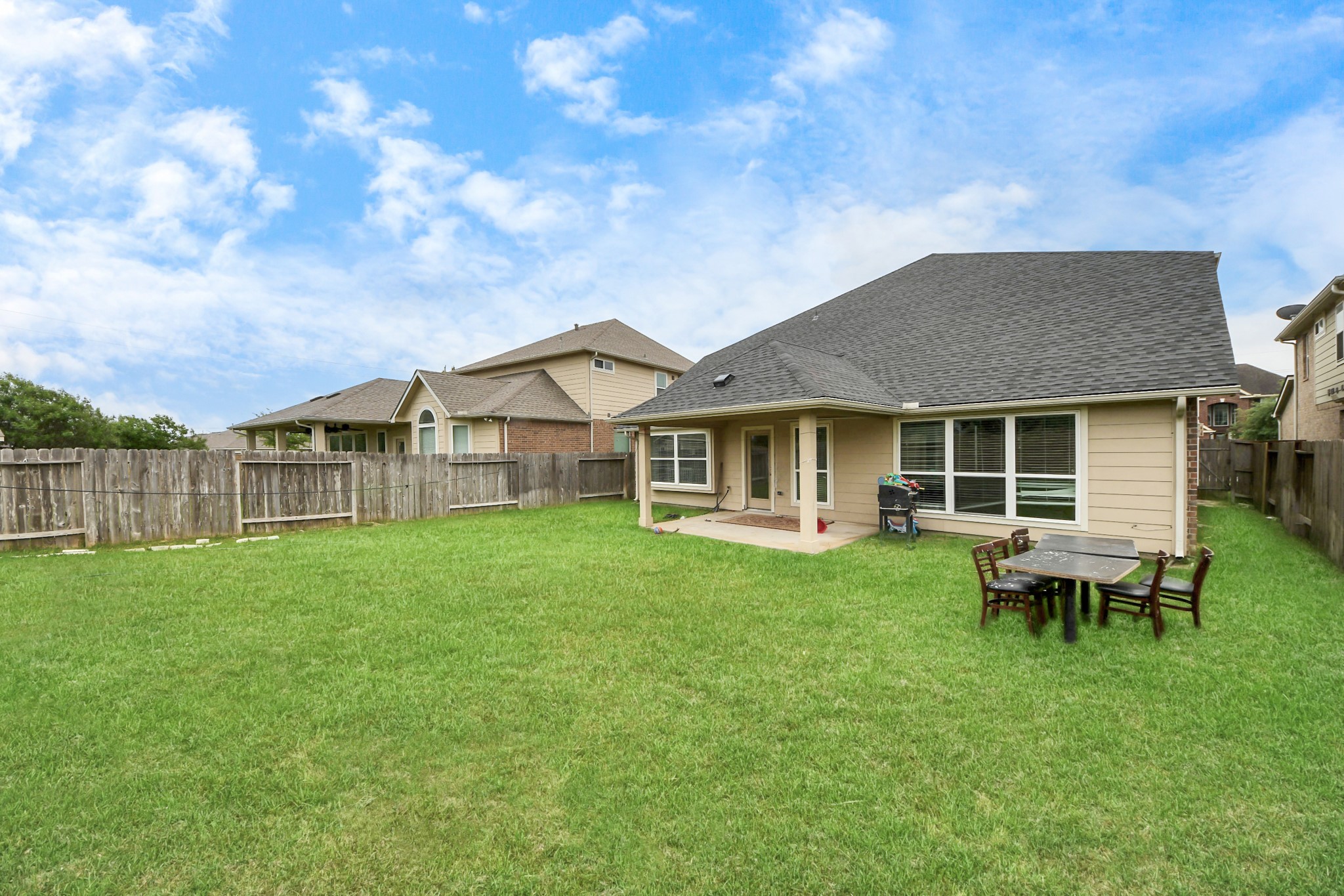 15210 Paxton Landing Lane Cypress, TX 77433 - Photo 48 of 50 a view of a house with a backyard