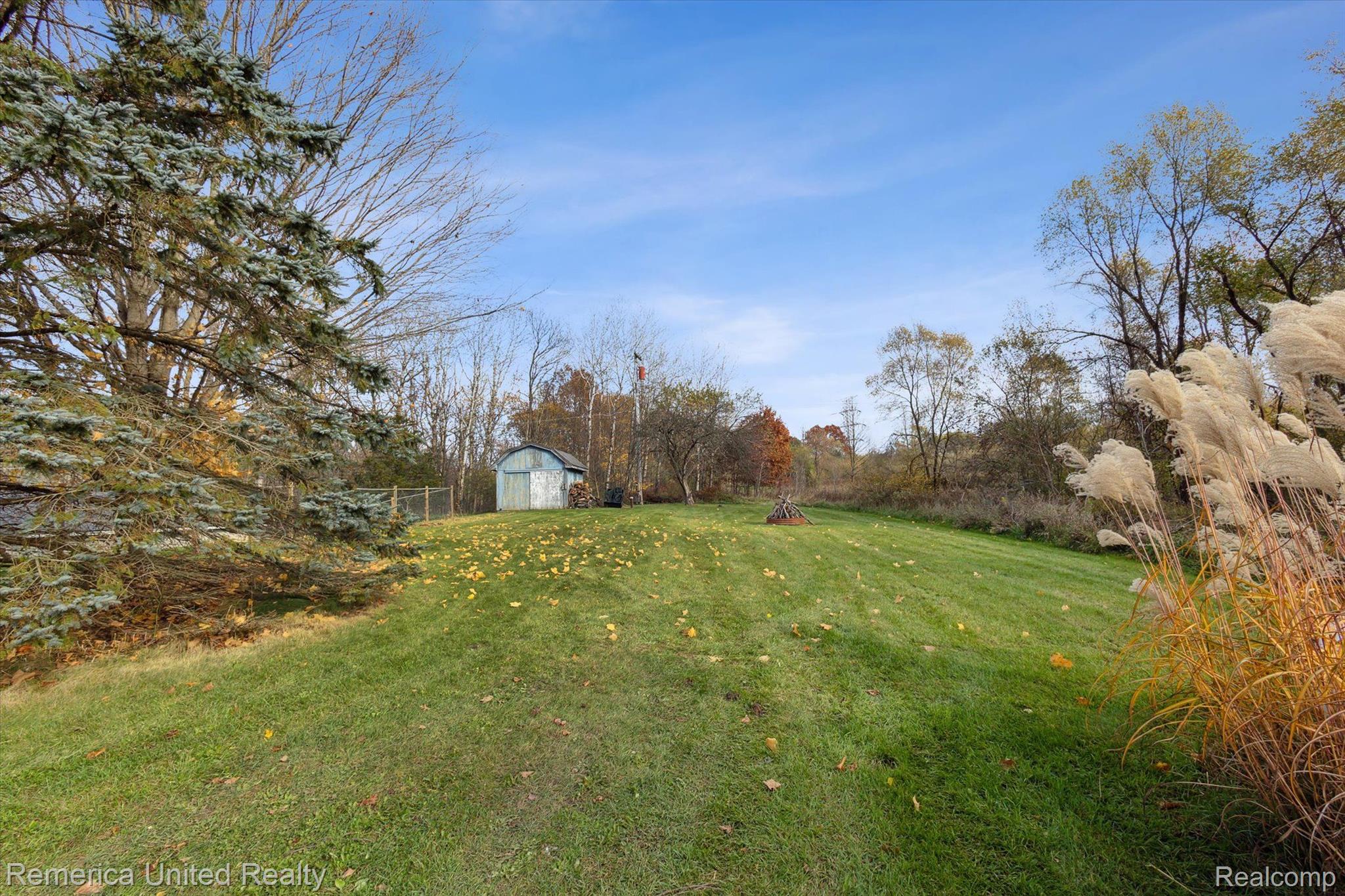 6051 Dutcher Road Howell, MI 48843 - Photo 42 of 42 Beautiful yard with shed