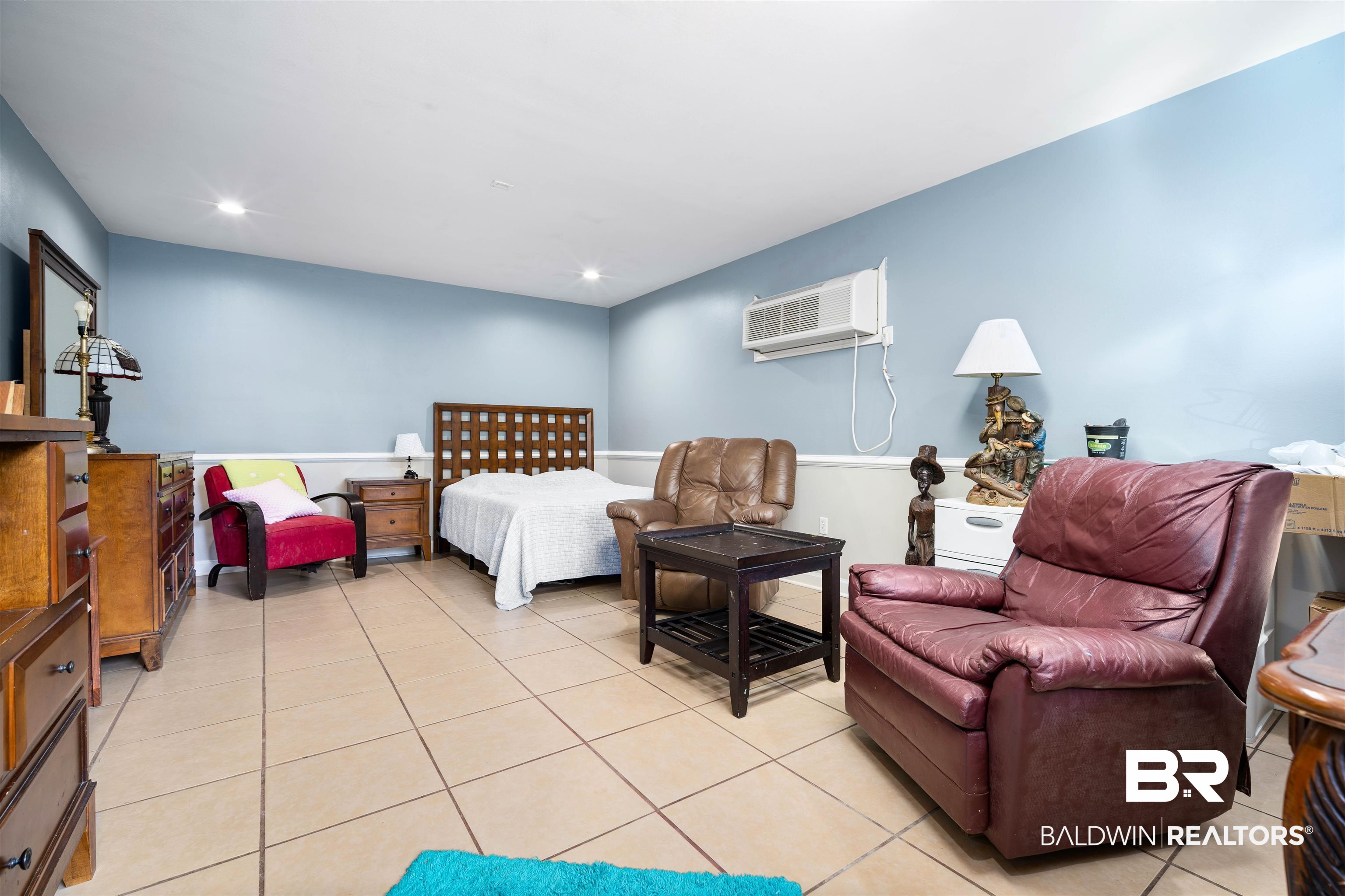 3010 Drag Strip Lane Coden, AL 36523 - Photo 29 of 44 Tiled Bonus room off carport with a wall mounted air conditioner