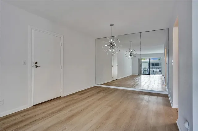 a bathroom with a bathtub and a toilet
