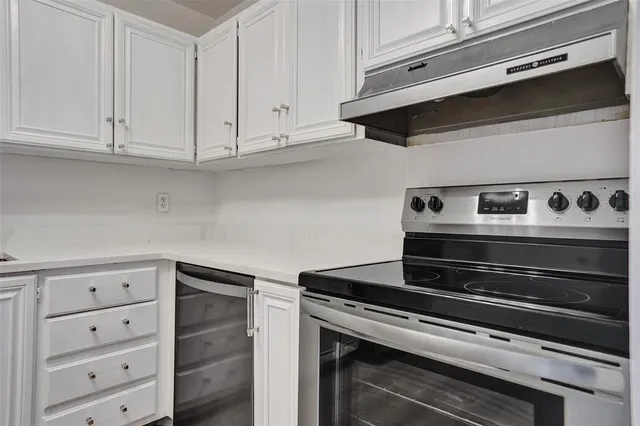 a view of a swimming pool with a lounge chairs