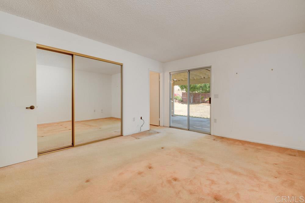 1706 Catalpa Road Carlsbad, CA 92011 - Photo 19 of 30 a view of an empty room with a window