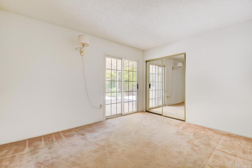 1706 Catalpa Road Carlsbad, CA 92011 - Photo 24 of 30 an empty room with windows