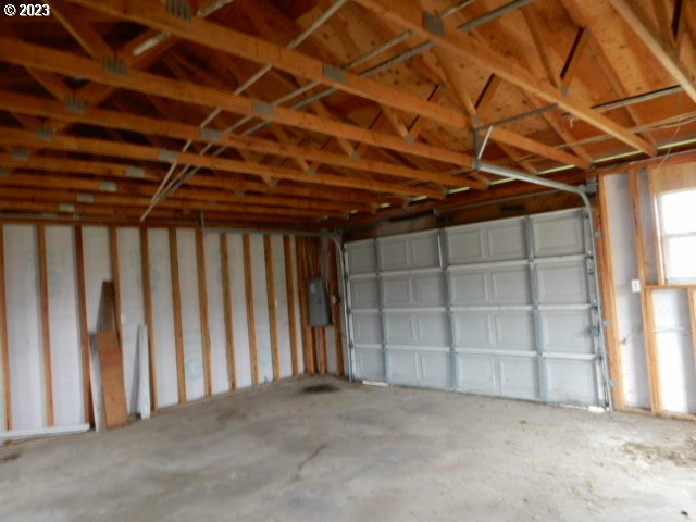 411 East 3rd Avenue Riddle, OR 97469 - Photo 17 of 21 a view of an empty room with a staircase