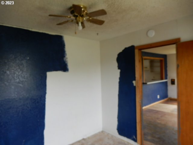 411 East 3rd Avenue Riddle, OR 97469 - Photo 7 of 21 a view of hallway with a elevator