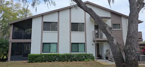 a front view of a house with garage