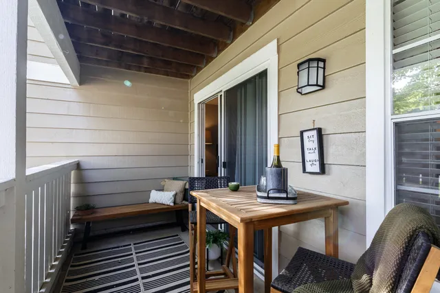 a view of a chairs and table in a room