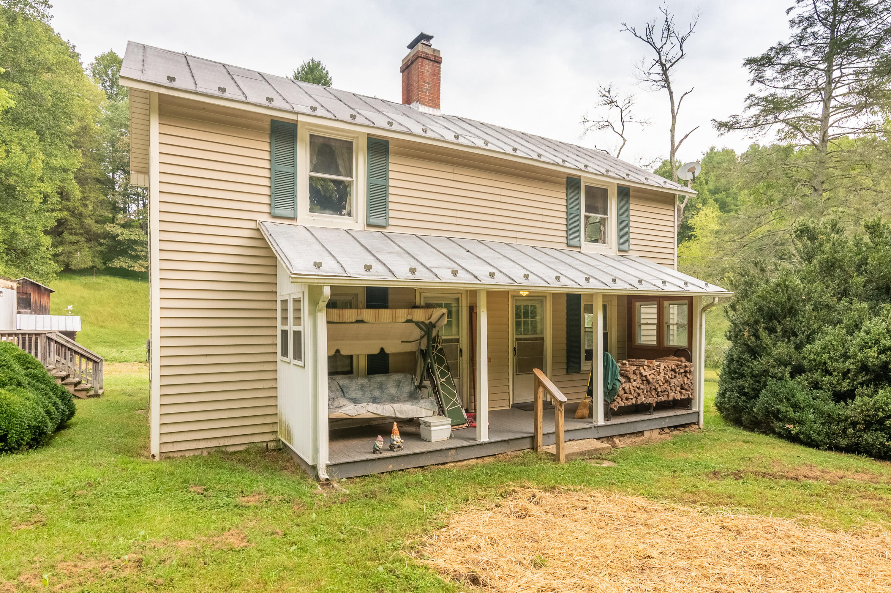 361 Wade Road Northwest Floyd, VA 24091 - Photo 13 of 48 a view of a house with a yard and sitting area