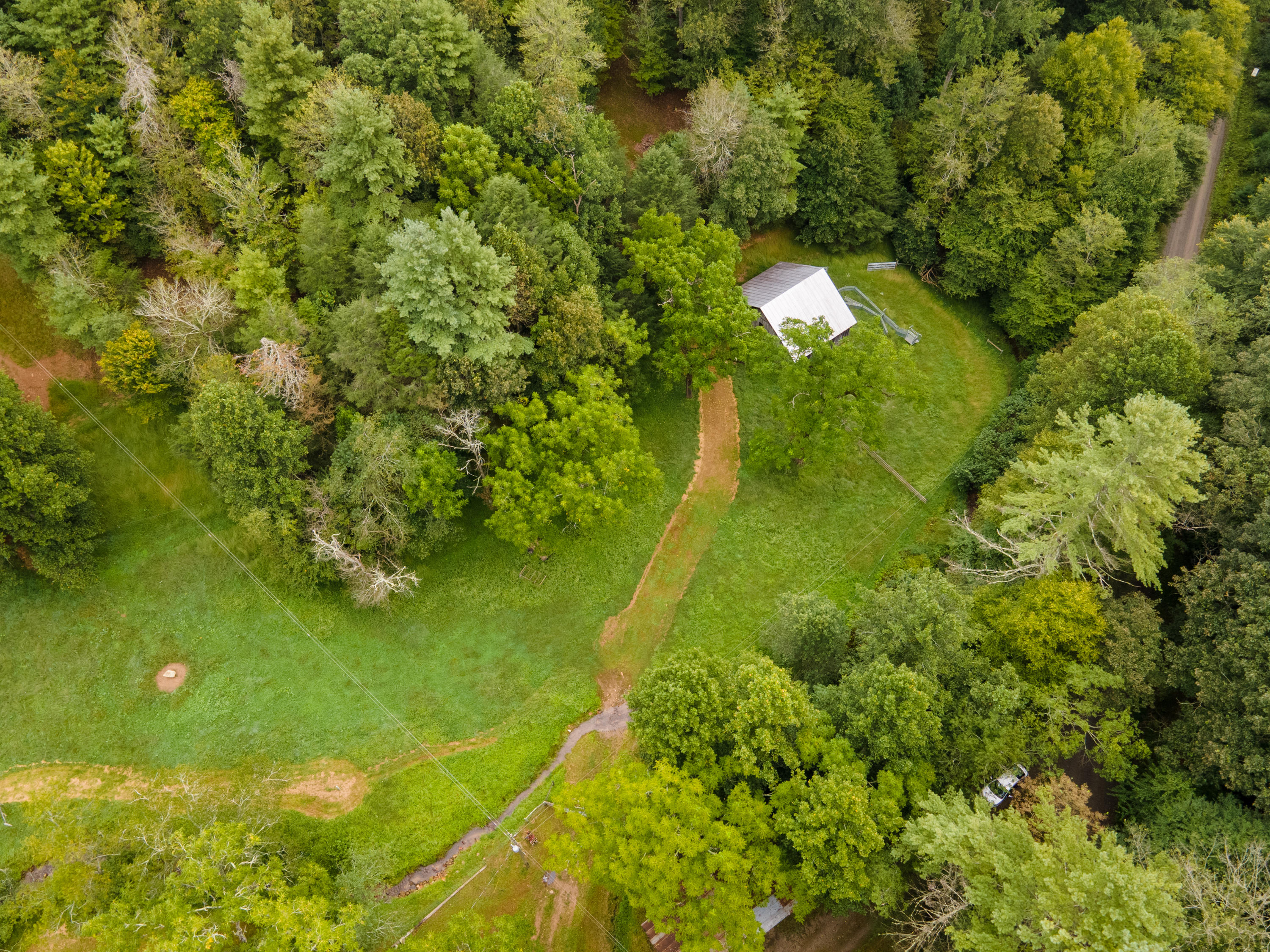 361 Wade Road Northwest Floyd, VA 24091 - Photo 3 of 48 a backyard of a house with lots of green space