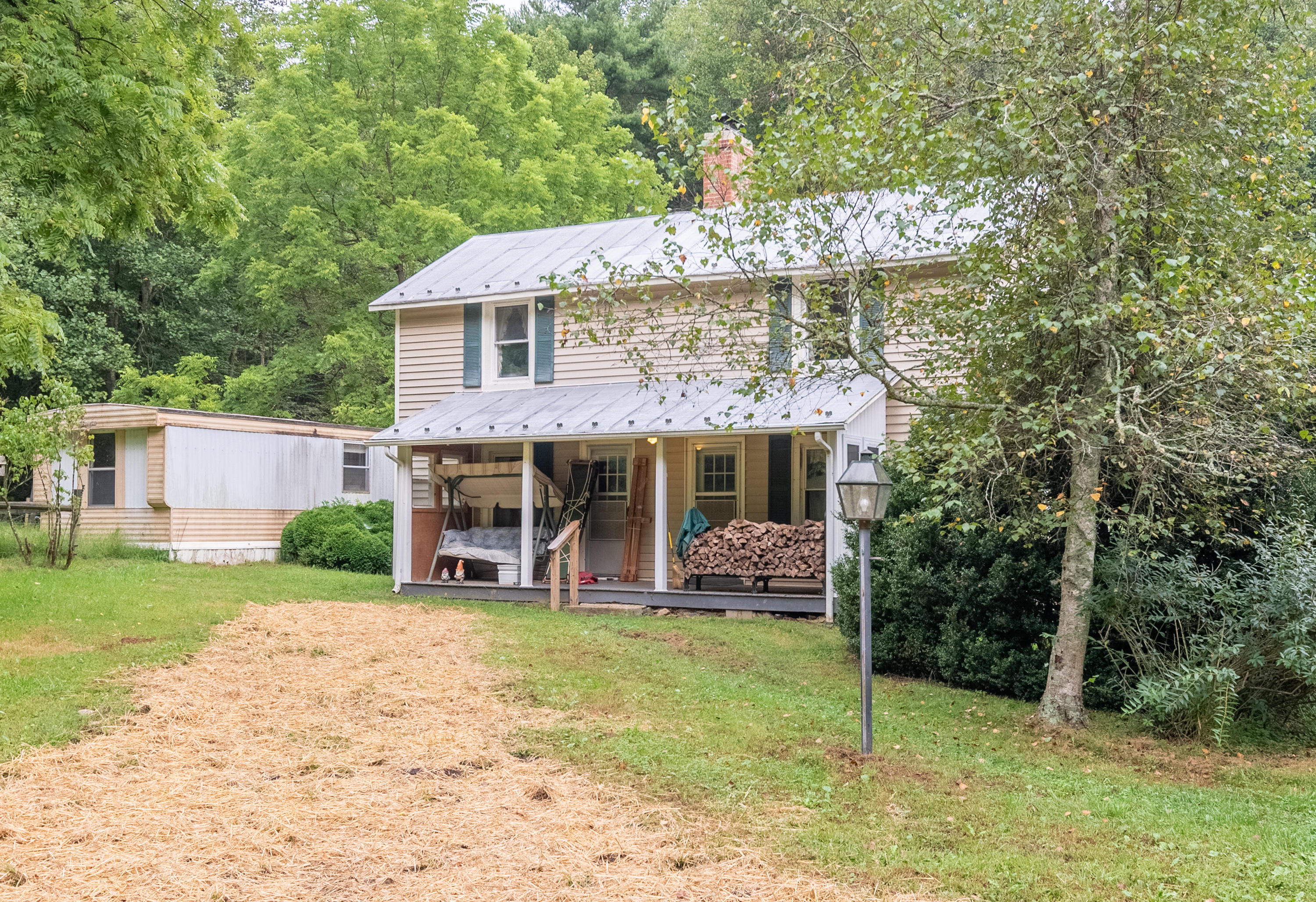 361 Wade Road Northwest Floyd, VA 24091 - Photo 5 of 48 a front view of a house with garden