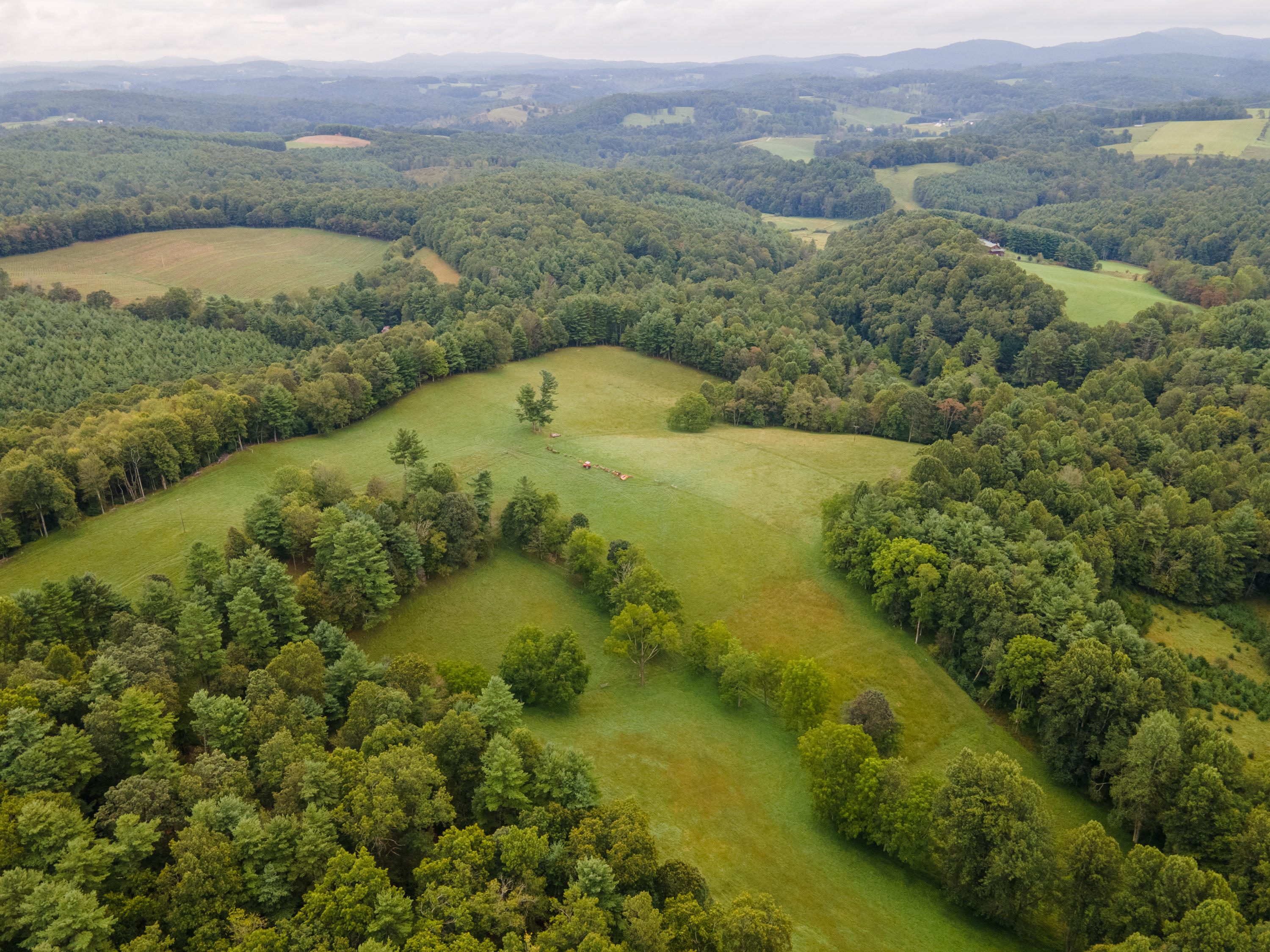 361 Wade Road Northwest Floyd, VA 24091 - Photo 47 of 48 a view of a lake with a mountain in the background