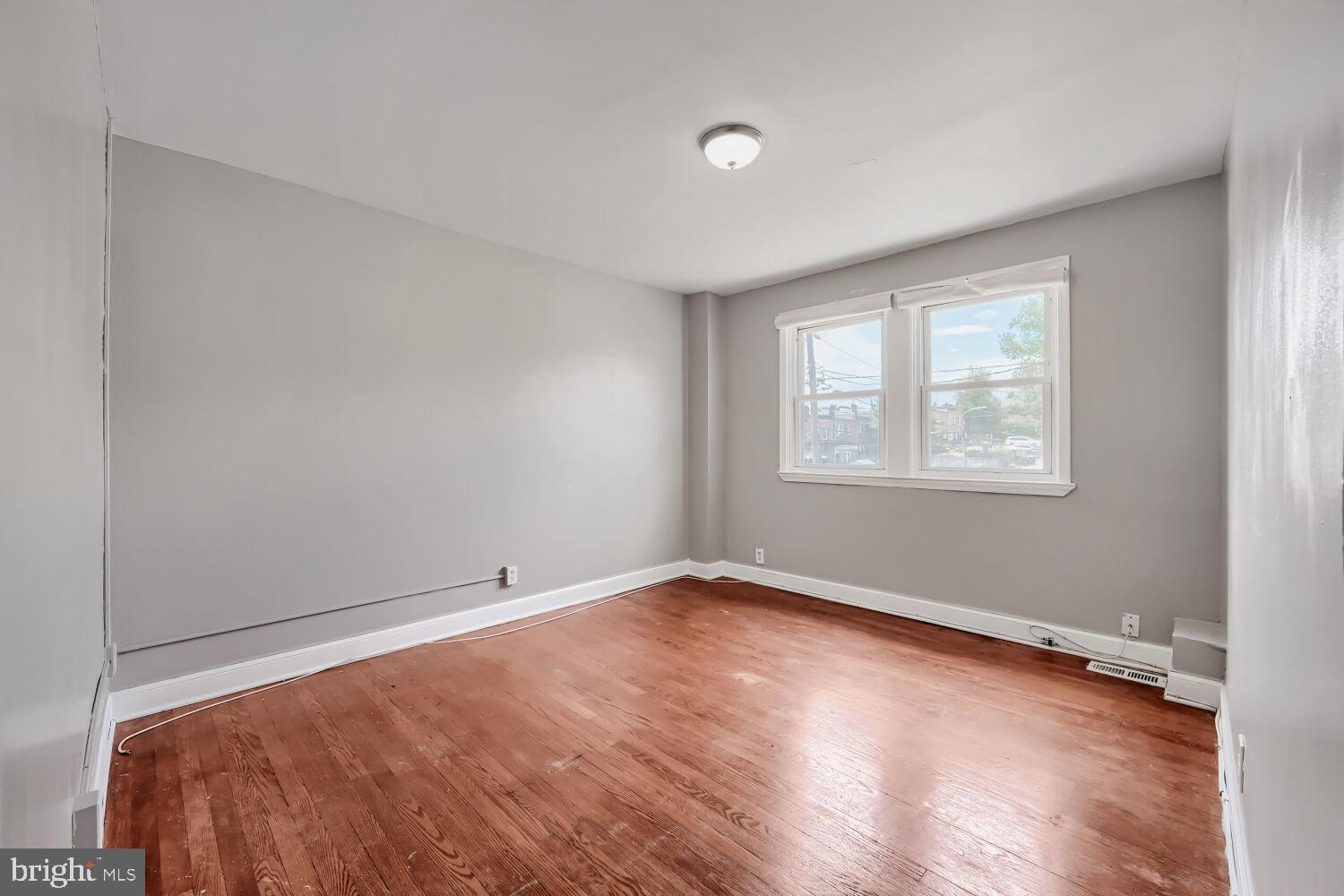 1014 Lyndhurst Street Baltimore, MD 21229 - Photo 16 of 29 a view of an empty room with a window