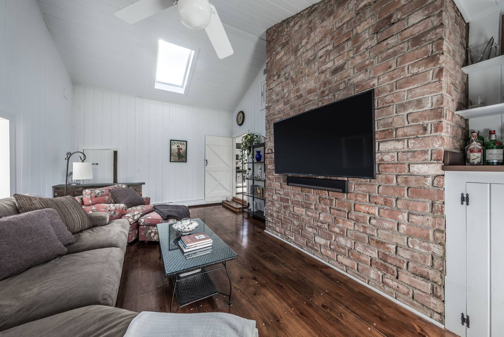 38 Glade Road East Hampton, NY 11937 - Photo 5 of 14 a living room with furniture and a flat screen tv