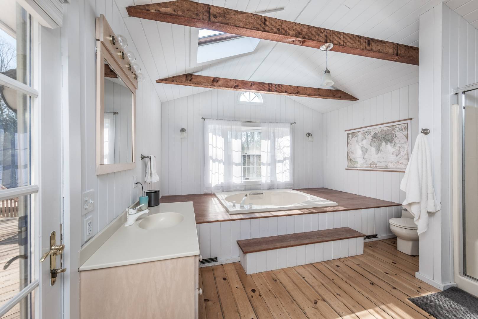 38 Glade Road East Hampton, NY 11937 - Photo 8 of 14 a room with a sink and a mirror