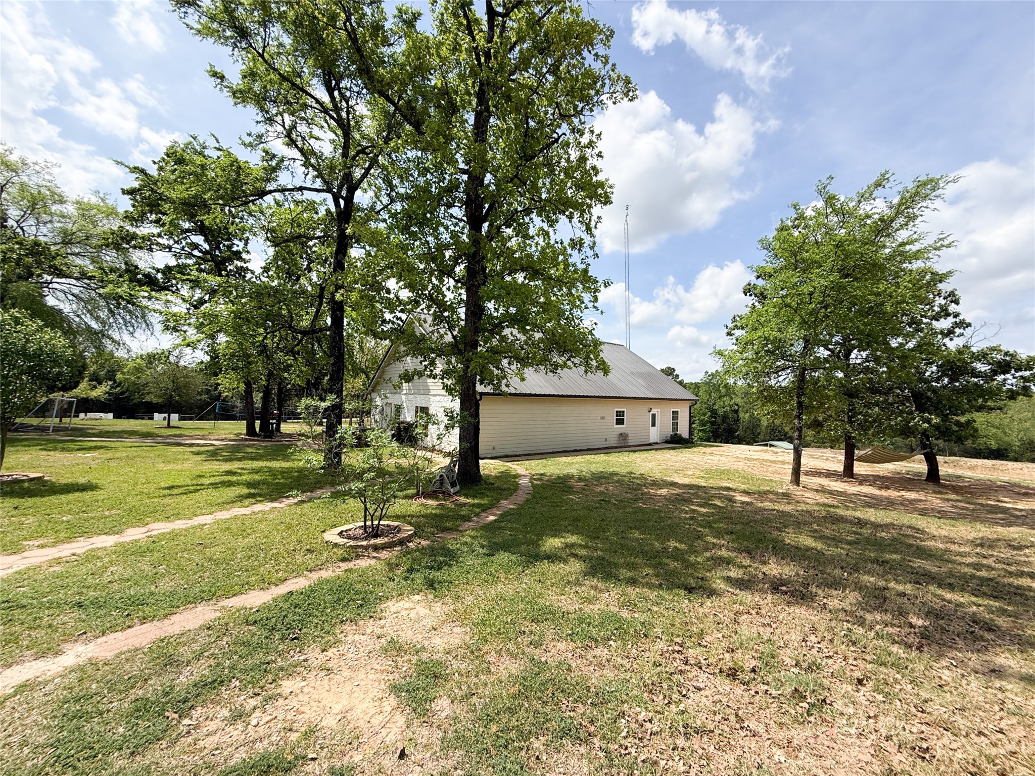 740 Bridget Avenue Buffalo, TX 75831 - Photo 8 of 50 a view of a yard with a tree