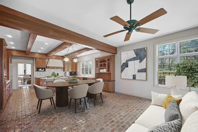 a kitchen with stainless steel appliances a refrigerator and cabinets