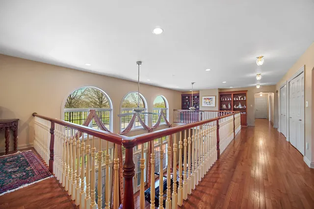 a large spacious bathroom with a large tub shower and sink