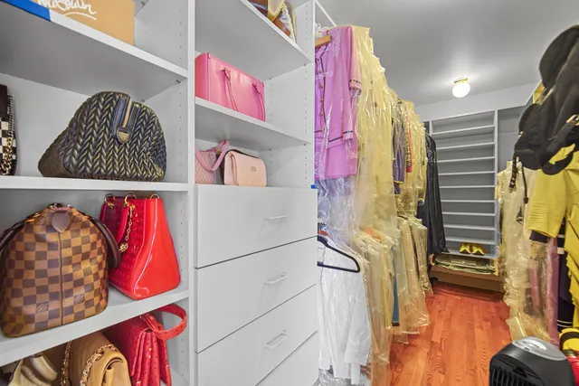 a room with furniture and a fan