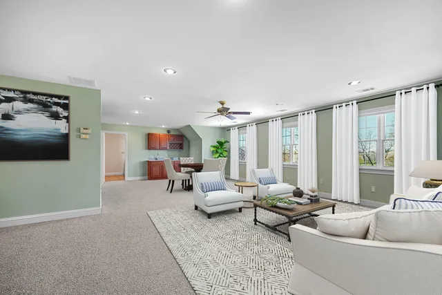 an empty room with a empty space and windows