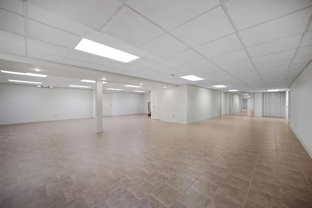 an aerial view of multiple houses with outdoor space