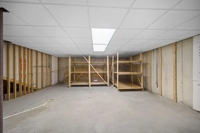 a view of a big house with a big yard