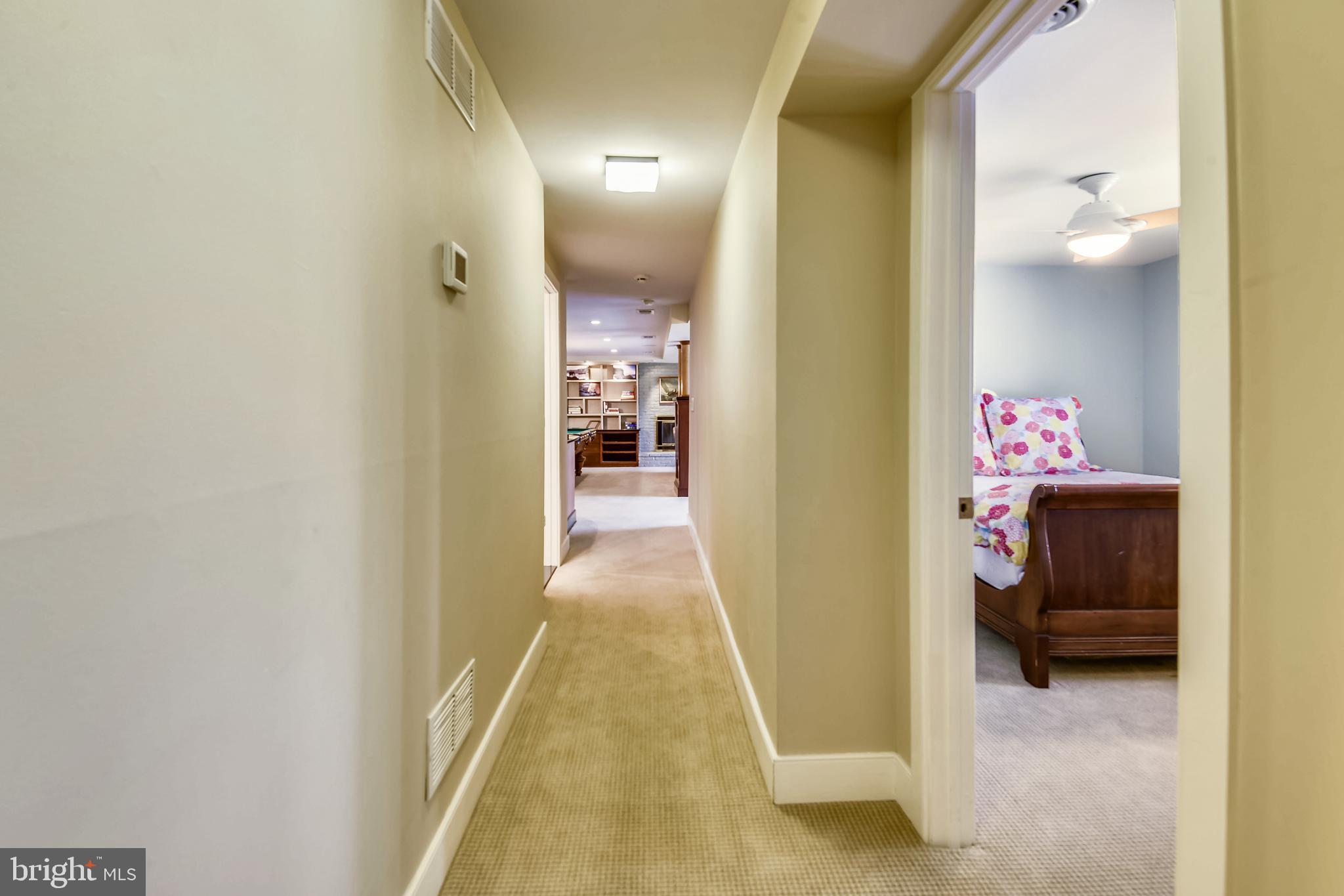 1220 Cavalier Road Arnold, MD 21012 - Photo 134 of 144 Lower level hall leads to family room