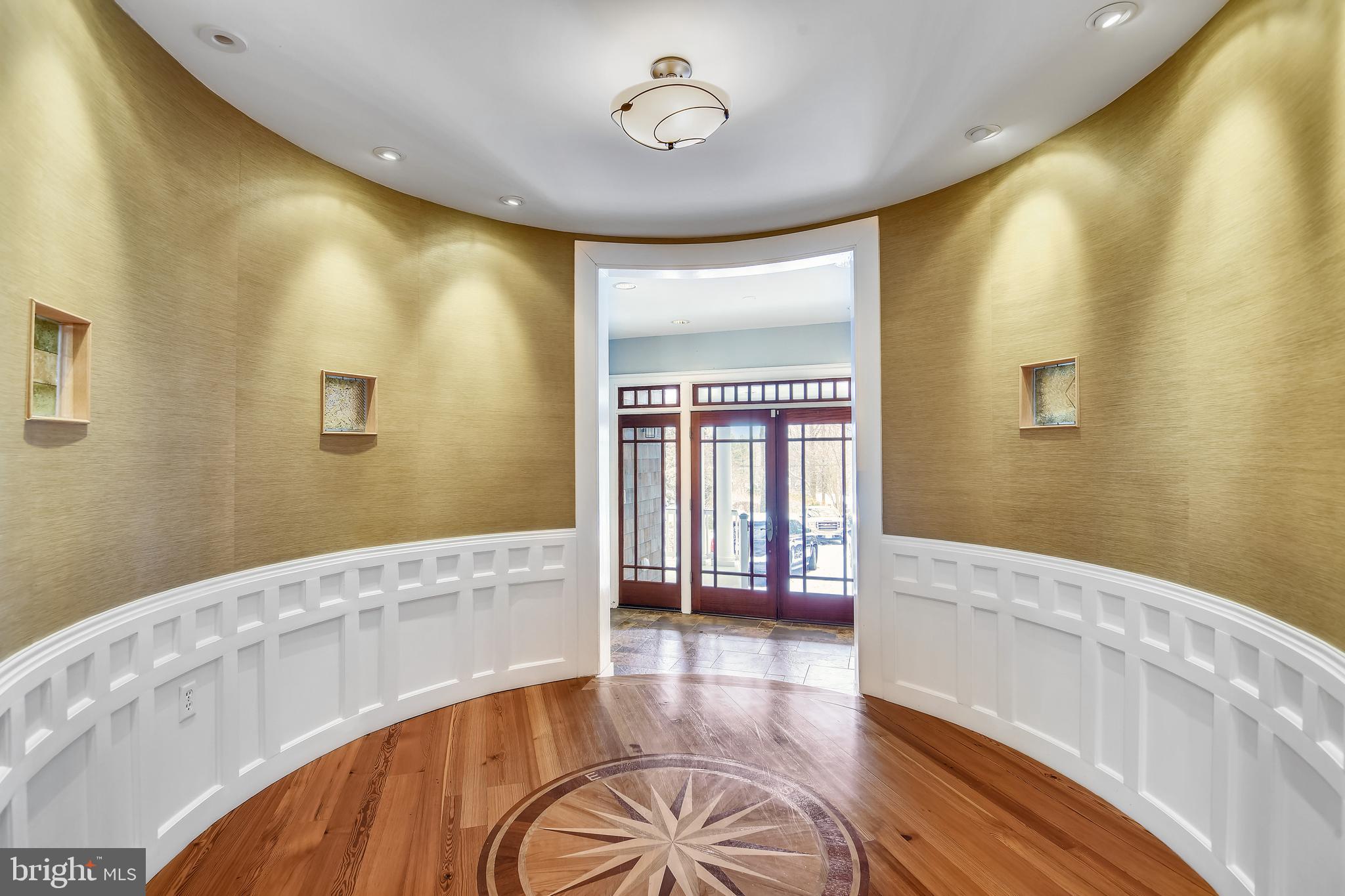 1220 Cavalier Road Arnold, MD 21012 - Photo 8 of 144 Center hall with compass rose inlaid