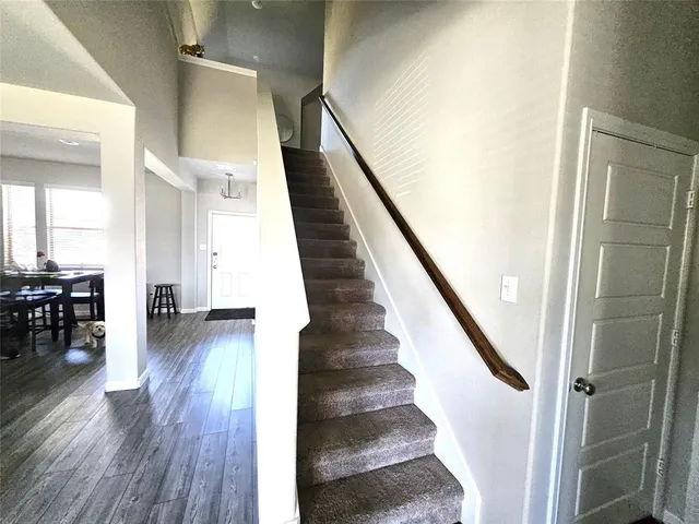 a kitchen with cabinets and steel stainless steel appliances