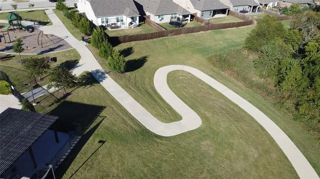 a view of a backyard with a patio