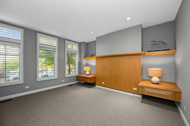 a bedroom with furniture and window