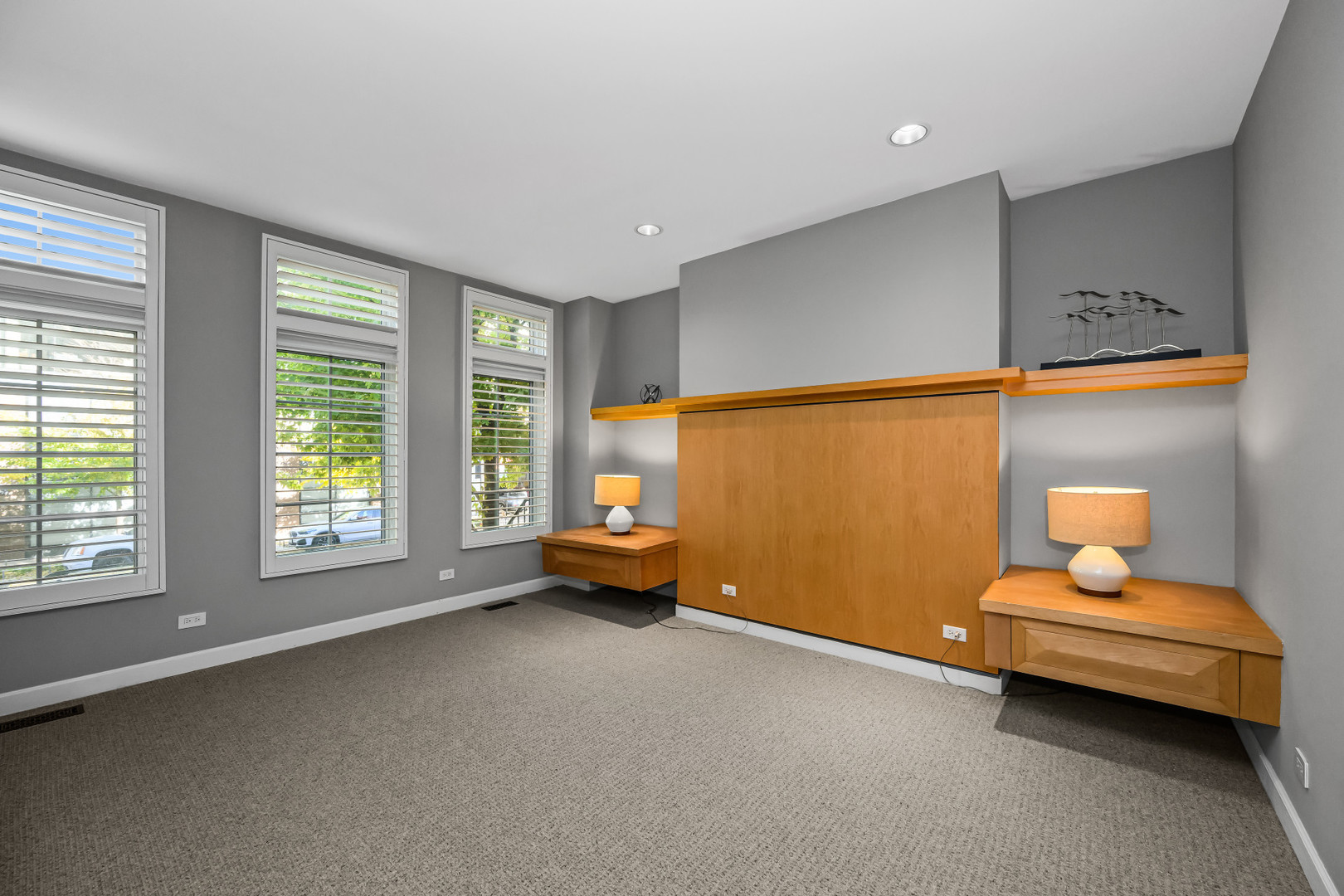 363 West Superior Street, Unit A Chicago, IL 60654 - Photo 7 of 18 a bedroom with furniture and window