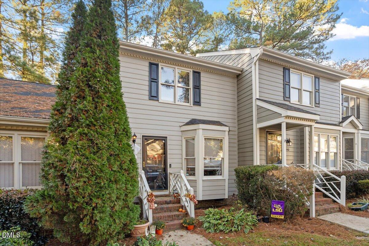 5442 Sharpe Drive Raleigh, NC 27612 - Photo 19 of 20 a view of a house with a yard and sitting area